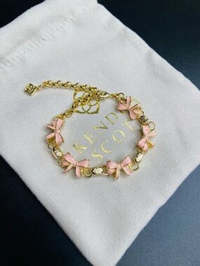 Kendra Scott Gold Bracelet with Pink Bow Charms